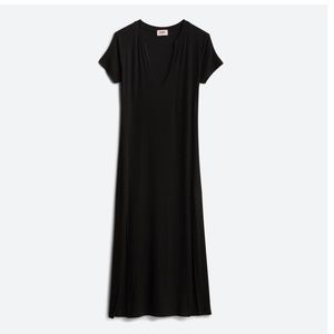 Never worn. Black midi dress.